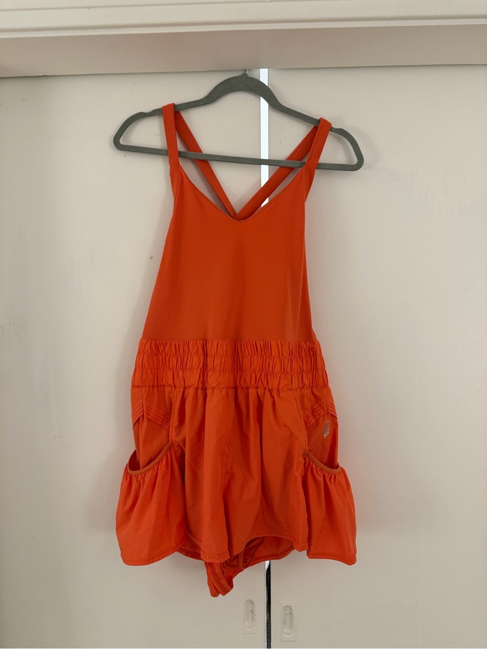 FP Movement by Free People Bright Orange Sleeveless Romper with Pockets